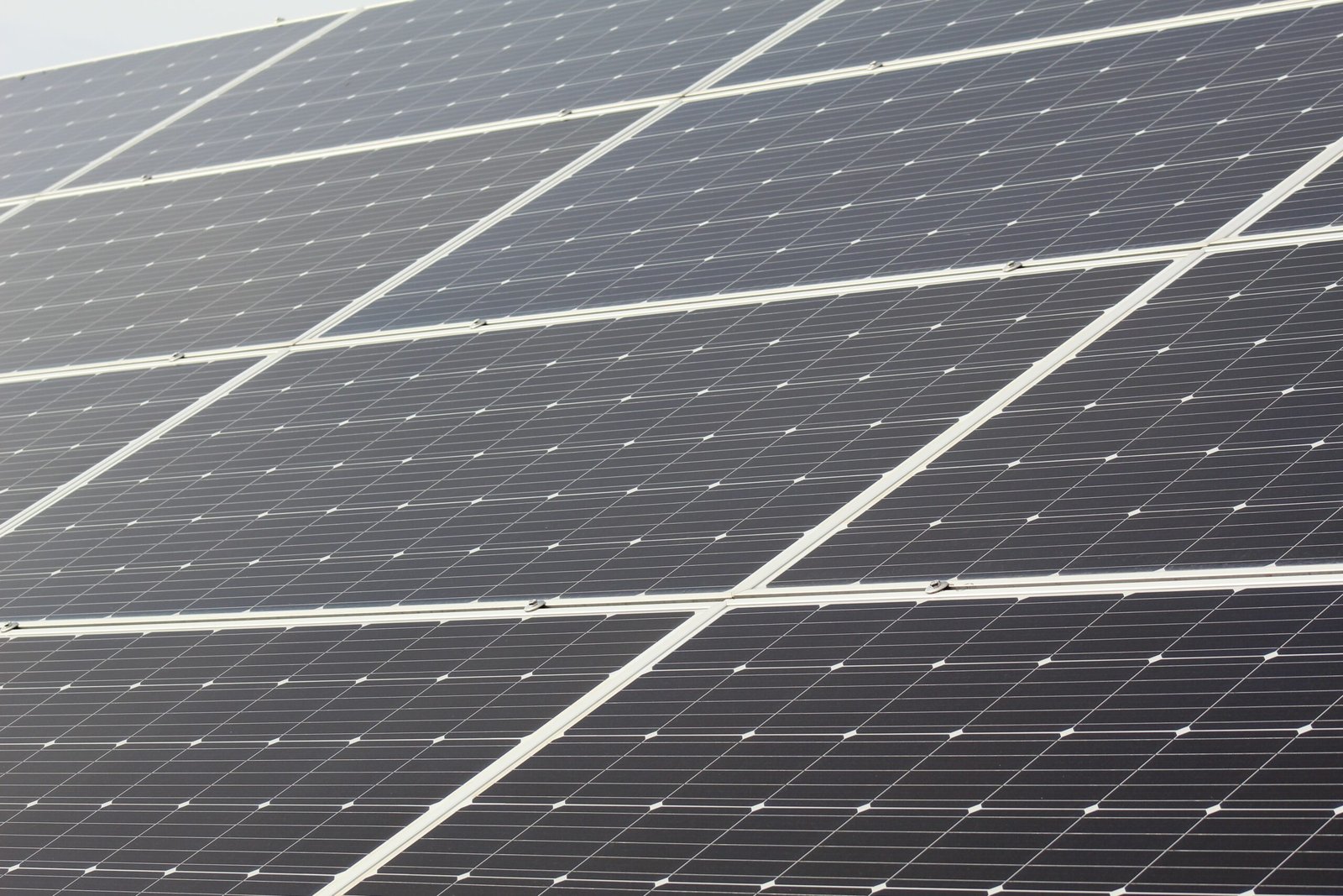 Detailed close-up of solar panels harnessing sunlight for sustainable energy generation.